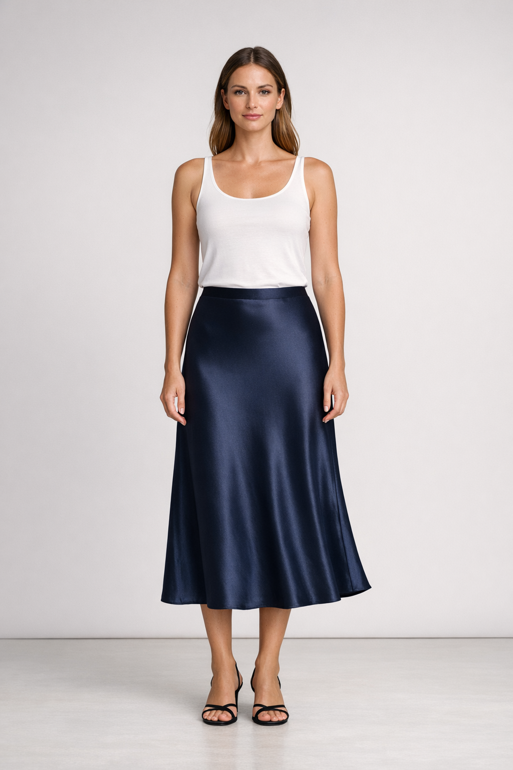 Iris Satin Midi Skirt on model in midnight navy